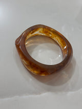 Bracciali rigidi effetto resina