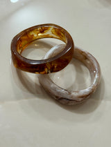 Bracciali rigidi effetto resina