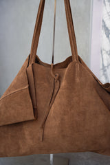 Borsa scamosciata con laccetto