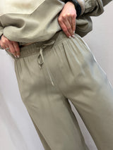 Pantalone con banda laterale Tensione In