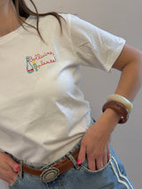 T-shirt bianca con scritta ricamata “bollicine”