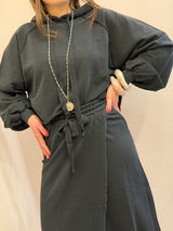 Gonna portafoglio in felpa, Kontatto