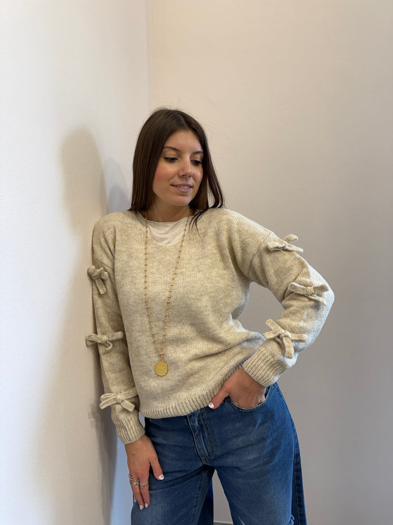Maglione con fiocchi Kontatto