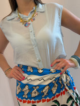 Camicia smanicata azzurra in mussola