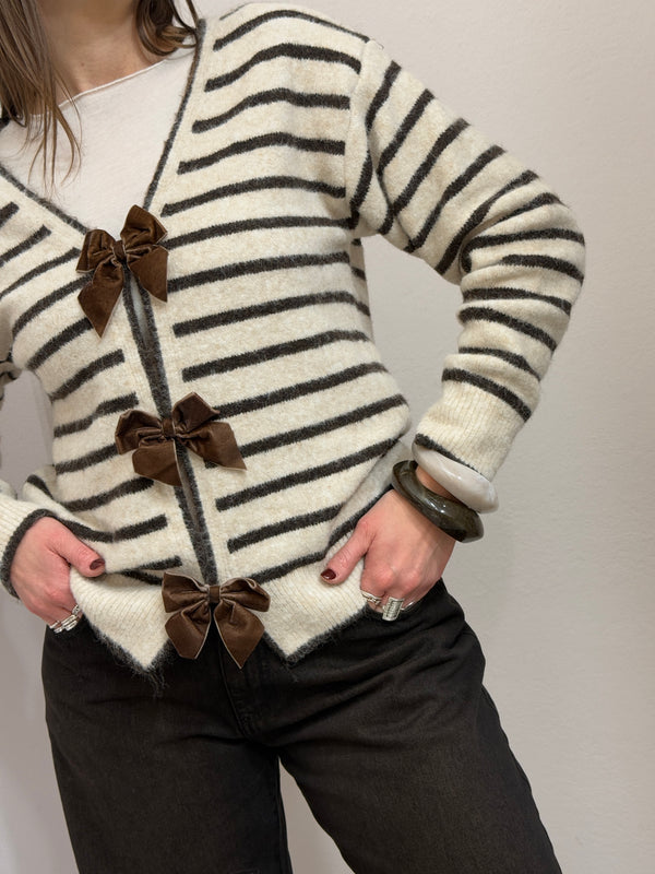 Maglione scollo a V con fiocchi