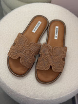 Ciabatta slip-on in tessuto intrecciato