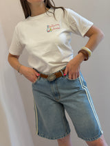 T-shirt bianca con scritta ricamata “bollicine”