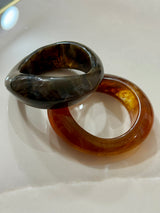 Bracciali rigidi effetto resina