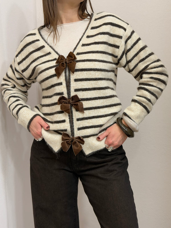 Maglione scollo a V con fiocchi