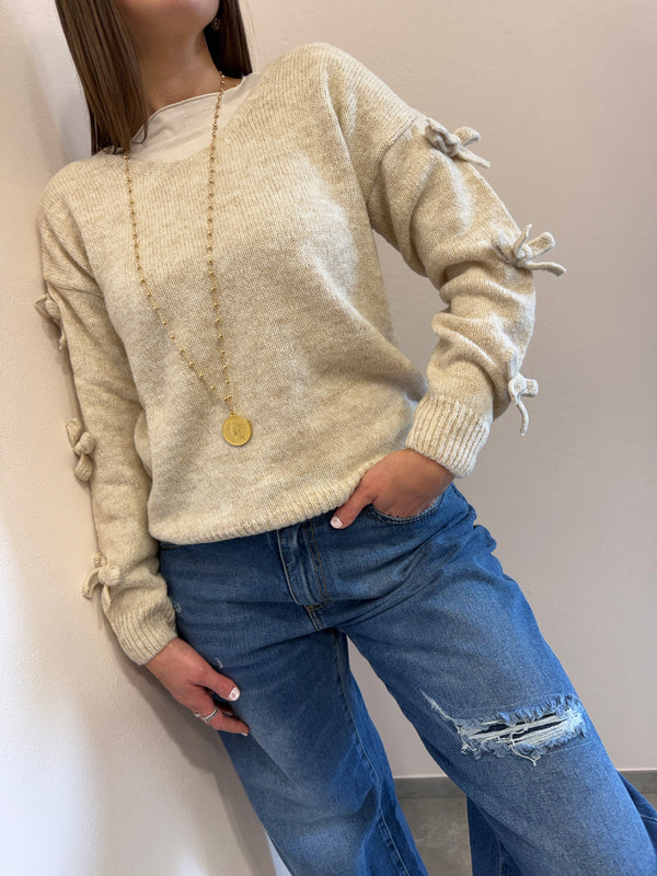 Maglione con fiocchi Kontatto