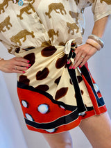 Gonna pareo corta con stampa grafica mix & match - Tensione in