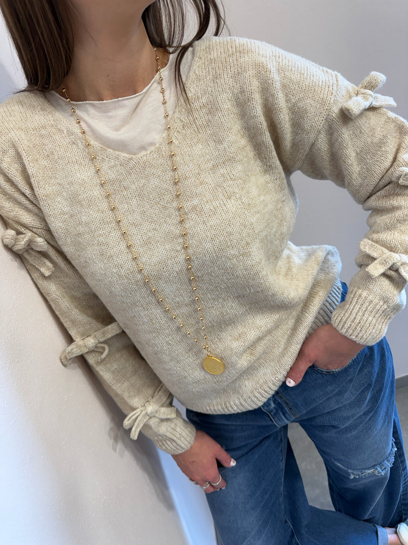 Maglione con fiocchi Kontatto