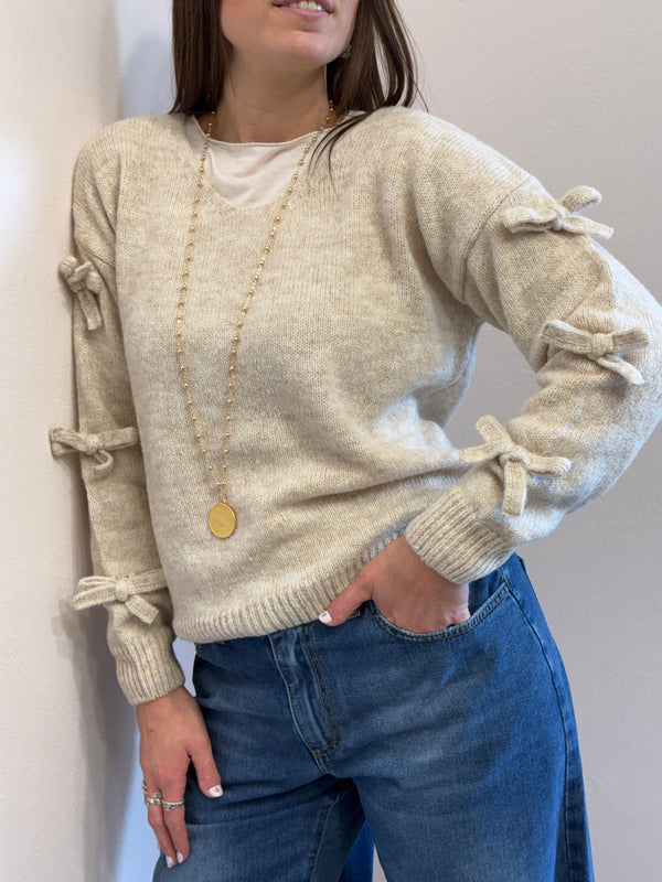 Maglione con fiocchi Kontatto